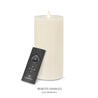 9" ivory candle with flickering flame